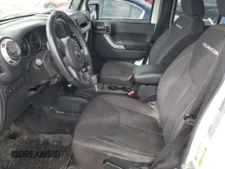 2017 Jeep Wrangler Unlimited Rubicon z VIN 1C4BJWFG5HL511601, wystawiony jako Copart lot #48223945 z przebiegiem 86 465 mil mil oraz Szkoda całkowita • Salvage title. Historia ofert i sprzedaży dostępna na DreamBid. Obrazek 7.