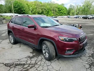 2019 Jeep Cherokee Latitude Plus z VIN 1C4PJMLNXKD192548, wystawiony jako Copart lot #55999925 z przebiegiem 28 762 mil mil oraz Szkoda całkowita • Salvage title. Historia ofert i sprzedaży dostępna na DreamBid. Obrazek 14.