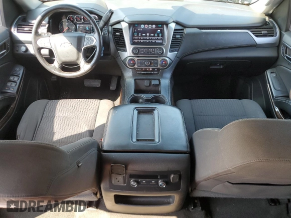 2018 Chevrolet Suburban LS z VIN 1GNSCGKC0JR278370, wystawiony jako Copart lot #57657395 z przebiegiem 224 903 mil mil oraz Czysty tytuł • Clean title. Historia ofert i sprzedaży dostępna na DreamBid. Obrazek 8.