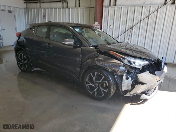 2021 Toyota C-HR LE with VIN NMTKHMBX5MR123006, listed as a Copart auction lot 50049265 with 115,023 mi miles and Salvage Title. Bid and sale history available at carsss.com. Image 4.