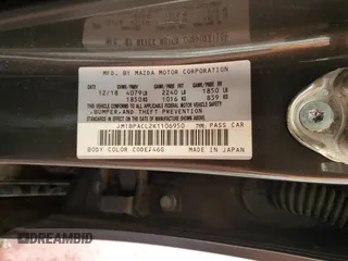2019 Mazda 3 Select z VIN JM1BPACL2K1106950, wystawiony jako Copart lot #59481345 z przebiegiem 56 582 mil mil oraz Szkoda całkowita • Salvage title. Historia ofert i sprzedaży dostępna na DreamBid. Obrazek 12.