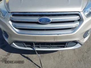 2017 Ford Escape SE with VIN 1FMCU9GD1HUC70823, listed as a IAAI auction lot 41898457 with 86,042 mi miles and . Bid and sale history available at DreamBid. Image 18.