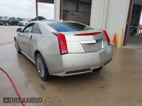 2013 Cadillac CTS Coupe Premium with VIN 1G6DS1E36D0107566, listed as a IAAI auction lot 42079197 with 122,386 mi miles. Bid and sale history available at carsss.com. Image 3.