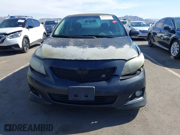 2010 Toyota Corolla with VIN 1NXBU4EE2AZ299148, listed as a IAAI auction lot 41884899 with 303,174 mi miles. Bid and sale history available at carsss.com. Image 6.
