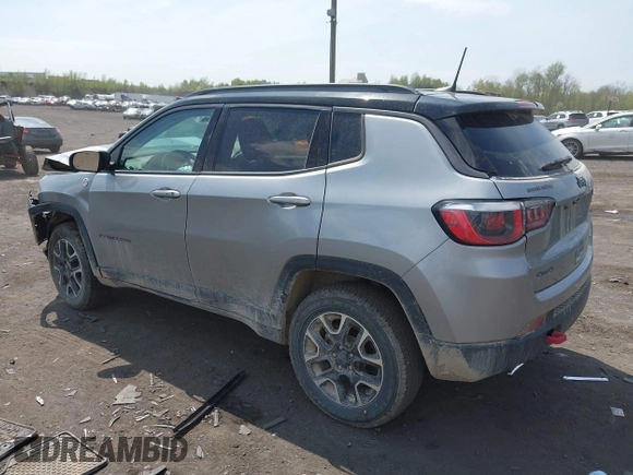 2020 Jeep Compass Trailhawk with VIN 3C4NJDDB4LT171685, listed as a IAAI auction lot 42168366 with 76,390 mi miles and . Bid and sale history available at DreamBid. Image 3.