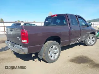 2005 Dodge 1500 SLT with VIN 1D7HU18D75S108492, listed as a IAAI auction lot 42030624 with 213,834 mi miles. Bid and sale history available at carsss.com. Image 4.