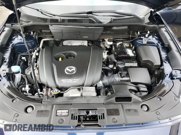 2018 Mazda CX-5 Touring with VIN JM3KFACM8J1349356, listed as a Copart auction lot 89154055 with 82,719 mi miles and Salvage Title. Bid and sale history available at carsss.com. Image 12.