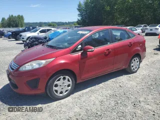 2013 Ford Fiesta SE z VIN 3FADP4BJ7DM205771, wystawiony jako Copart lot #60378615 z przebiegiem 101 281 mil mil oraz Czysty tytuł • Clean title. Historia ofert i sprzedaży dostępna na DreamBid. Obrazek 1.