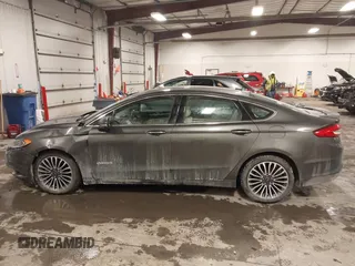 2018 Ford Fusion Hybrid Titanium with VIN 3FA6P0RU4JR147831, listed as a IAAI auction lot 41586033 with 101,088 mi miles. Bid and sale history available at carsss.com. Image 14.