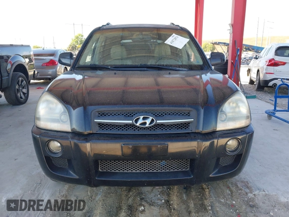 2007 Hyundai Tucson SE with VIN KM8JN12D07U475917, listed as a IAAI auction lot 41872876 with 172,006 mi miles. Bid and sale history available at carsss.com. Image 6.