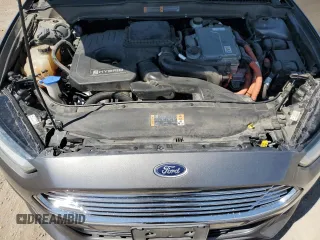 2014 Ford Fusion SE Hybrid with VIN 3FA6P0LU3ER306739, listed as a Copart auction lot 69887454 with 114,150 mi miles and Salvage title. Bid and sale history available at DreamBid. Image 12.