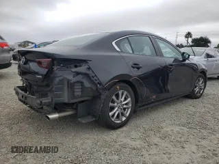 2021 Mazda 3 2.0 z VIN 3MZBPAA7XMM203287, wystawiony jako Copart lot #60079135 z przebiegiem 49 212 mil mil oraz Szkoda całkowita • Salvage title. Historia ofert i sprzedaży dostępna na DreamBid. Obrazek 3.