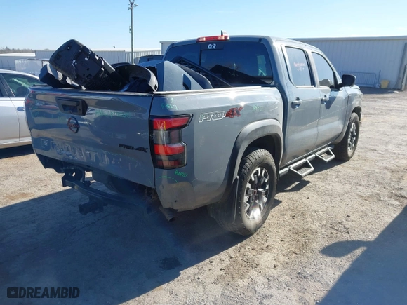 2023 Nissan Frontier PRO-4X with VIN 1N6ED1EK7PN670665, listed as a IAAI auction lot 41785130 with 21,561 mi miles. Bid and sale history available at carsss.com. Image 4.