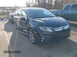 2019 Honda Odyssey EX-L with VIN 5FNRL6H74KB061567, listed as a IAAI auction lot 41810919 with 129,146 mi miles. Bid and sale history available at carsss.com. Image 1.