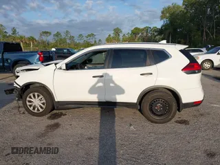 2017 Nissan Rogue SL with VIN JN8AT2MT0HW137951, listed as a IAAI auction lot 42017563 with 124,168 mi miles and . Bid and sale history available at DreamBid. Image 14.
