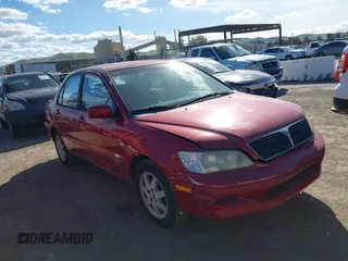2002 Mitsubishi Lancer LS with VIN JA3AJ36E82U063279, listed as a IAAI auction lot 41711543 with 39,127 mi miles. Bid and sale history available at carsss.com. Image 1.