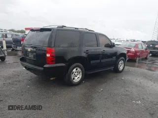 2013 Chevrolet Tahoe LS with VIN 1GNSCAE07DR223062, listed as a IAAI auction lot 41948276 with 196,616 mi miles and . Bid and sale history available at DreamBid. Image 4.