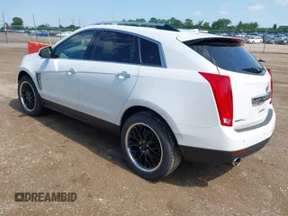 2013 Cadillac SRX Performance Collection with VIN 3GYFNHE3XDS520177, listed as a IAAI auction lot 42536457 with 217,963 mi miles and . Bid and sale history available at DreamBid. Image 3.