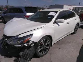 2016 Nissan Altima SR with VIN 1N4AL3AP0GC230628, listed as a IAAI auction lot 41780598 with 102,169 mi miles and . Bid and sale history available at carsss.com. Image 2.