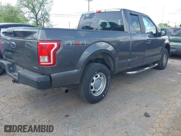 2015 Ford F-150 XLT with VIN 1FTEX1E89FKD84587, listed as a IAAI auction lot 42102545 with 141,265 mi miles. Bid and sale history available at carsss.com. Image 4.