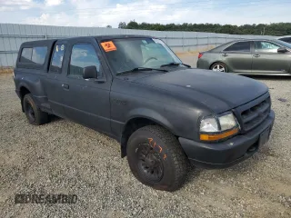 1999 Ford Ranger XL with VIN 1FTZR15V1XPB88455, listed as a Copart auction lot 61976915 with 117,711 mi miles and Salvage title. Bid and sale history available at DreamBid. Image 4.