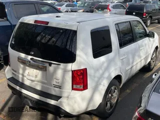 2015 Honda Pilot SE with VIN 5FNYF4H39FB028011, listed as a Copart auction lot 55280155 with 202,846 mi miles and Clean Title. Bid and sale history available at carsss.com. Image 4.