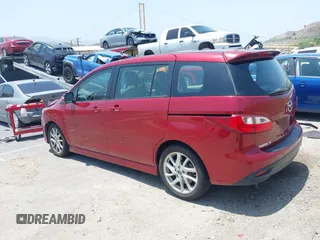 2015 Mazda 5 Grand Touring with VIN JM1CW2DL6F0190312, listed as a IAAI auction lot 42433782 with 79,140 mi miles and . Bid and sale history available at DreamBid. Image 3.