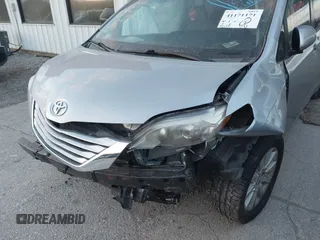 2016 Toyota Sienna LE with VIN 5TDJK3DC4GS133694, listed as a IAAI auction lot 41171171 with 99,680 mi miles. Bid and sale history available at carsss.com. Image 6.