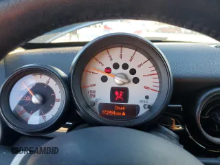 2012 MINI Roadster S z VIN WMWSY3C51CT565240, wystawiony jako Copart lot #83651954 z przebiegiem 172 954 mil mil oraz Szkody całkowita. Historia ofert i sprzedaży dostępna na DreamBid. Obrazek 9.