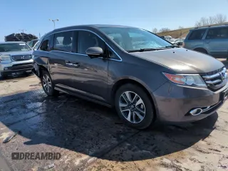 2014 Honda Odyssey Touring with VIN 5FNRL5H95EB052523, listed as a Copart auction lot 52214055 with 131,350 mi miles and Salvage Title. Bid and sale history available at DreamBid. Image 14.