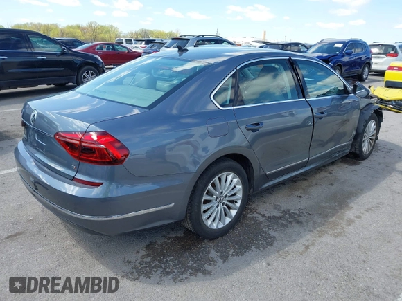 2017 Volkswagen Passat SE with VIN 1VWBT7A3XHC015940, listed as a IAAI auction lot 42027997 with 28,442 mi miles and . Bid and sale history available at DreamBid. Image 4.