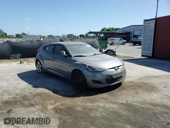 2012 Hyundai Veloster w/Black Int z VIN KMHTC6AD4CU046609, wystawiony jako Copart lot #54888045 z przebiegiem 152 997 mil mil oraz Szkoda całkowita • Salvage title. Historia ofert i sprzedaży dostępna na DreamBid. Obrazek 13.