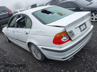 2001 BMW 3 Series 330i with VIN WBAAV53421FJ63150, listed as a IAAI auction lot 41737275 with 999,999 mi miles. Bid and sale history available at carsss.com. Image 3.