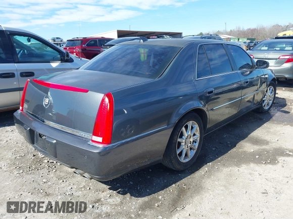 2011 Cadillac DTS Premium Collection z VIN 1G6KH5E68BU124852, wystawiony jako IAAI lot #41652793 z przebiegiem 227 148 mil mil oraz . Historia ofert i sprzedaży dostępna na DreamBid. Obrazek 4.