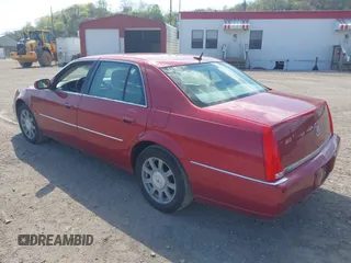 2008 Cadillac DTS 1SC with VIN 1G6KD57Y68U142382, listed as a IAAI auction lot 42093859 with 73,960 mi miles and . Bid and sale history available at carsss.com. Image 3.