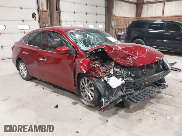 2019 Nissan Sentra S z VIN 3N1AB7AP7KY257283, wystawiony jako IAAI lot #42012338 z przebiegiem 103 503 mil mil oraz . Historia ofert i sprzedaży dostępna na DreamBid. Obrazek 1.