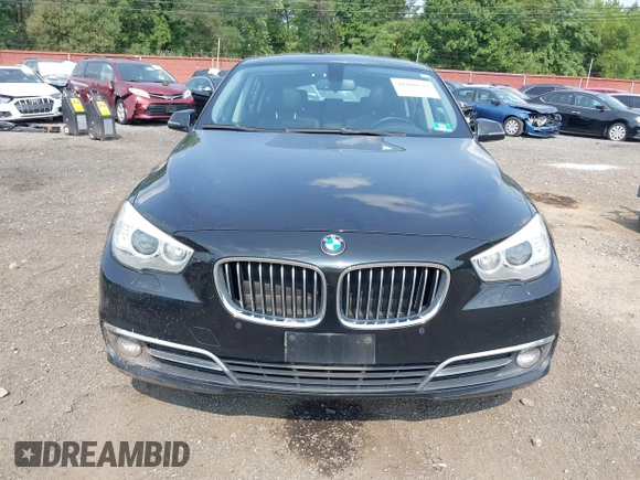 2014 BMW 5 Series GT 535i Gran Turismo xDrive with VIN WBA5M4C56ED183815, listed as a IAAI auction lot 40100547 with 150,358 mi miles and . Bid and sale history available at carsss.com. Image 6.