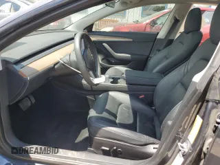 2023 Tesla Model 3 with VIN 5YJ3E1EA4PF614129, listed as a Copart auction lot 62019385 with 23,218 mi miles and Salvage title. Bid and sale history available at DreamBid. Image 7.