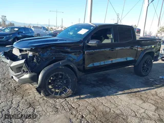 2024 Chevrolet Colorado 4WD Trail Boss with VIN 1GCPTEEK8R1137191, listed as a IAAI auction lot 41760382 with 27,068 mi miles. Bid and sale history available at carsss.com. Image 2.