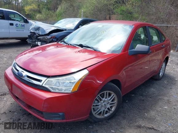 2009 Ford Focus SE with VIN 1FAHP35N89W243205, listed as a IAAI auction lot 42149989 with 148,058 mi miles. Bid and sale history available at carsss.com. Image 2.