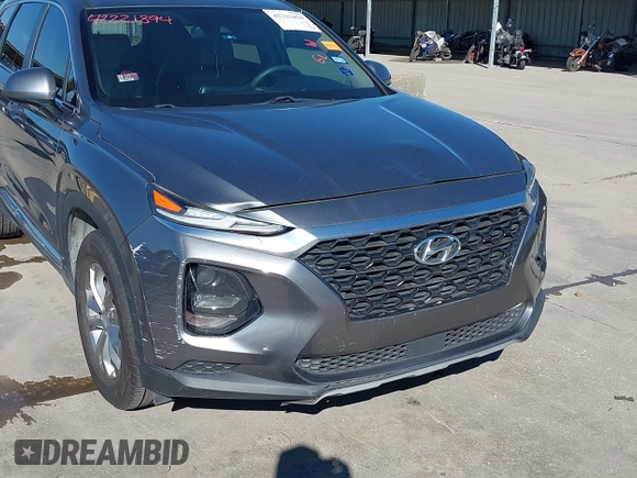 2019 Hyundai Santa Fe SE z VIN 5NMS23AD9KH037539, wystawiony jako IAAI lot #42221894 z przebiegiem 87 755 mil mil oraz . Historia ofert i sprzedaży dostępna na DreamBid. Obrazek 6.