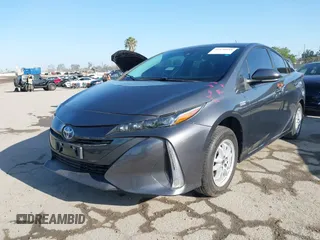 2021 Toyota Prius LE with VIN JTDKAMFP1M3195662, listed as a IAAI auction lot 42799476 with 47,560 mi miles and . Bid and sale history available at DreamBid. Image 2.