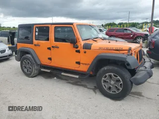 2013 Jeep Wrangler Unlimited Rubicon with VIN 1C4BJWFGXDL545866, listed as a Copart auction lot 59788115 with 102,617 mi miles and Salvage title. Bid and sale history available at DreamBid. Image 4.