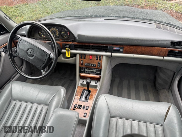 1988 Mercedes-Benz 560 with VIN WDBCA39D1JA406073, listed as a Copart auction lot 50398345 with 111,524 mi miles and Clean Title. Bid and sale history available at DreamBid. Image 9.