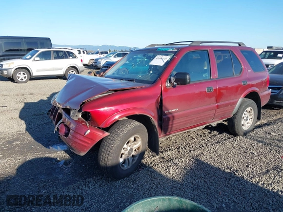 2002 Isuzu Rodeo with VIN 4S2DM58W624335632, listed as a IAAI auction lot 41690735 with 186,480 mi miles and . Bid and sale history available at DreamBid. Image 2.