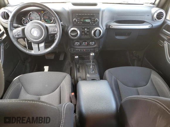 2015 Jeep Wrangler Unlimited Rubicon with VIN 1C4BJWFGXFL752602, listed as a Copart auction lot 54102395 with 26,466 mi miles and Salvage title. Bid and sale history available at DreamBid. Image 8.