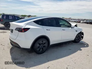 2024 Tesla Model Y Long Range z VIN 7SAYGDEE0RA313929, wystawiony jako Copart lot #59548725 z przebiegiem Nie podano mil oraz Szkoda całkowita • Salvage title. Historia ofert i sprzedaży dostępna na DreamBid. Obrazek 3.