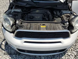 2014 MINI Countryman S z VIN WMWZC3C57EWP29444, wystawiony jako Copart lot #56141455 z przebiegiem 140 443 mil mil oraz Szkoda całkowita • Salvage title. Historia ofert i sprzedaży dostępna na DreamBid. Obrazek 11.