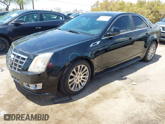 2012 Cadillac CTS Premium with VIN 1G6DP5E35C0129064, listed as a IAAI auction lot 42666308 with 151,694 mi miles and . Bid and sale history available at DreamBid. Image 2.