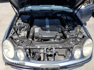 2004 Mercedes-Benz E-Class 5.0L with VIN WDBUF70JX4A479530, listed as a Copart auction lot 68093214 with 165,986 mi miles and Clean Title. Bid and sale history available at carsss.com. Image 11.